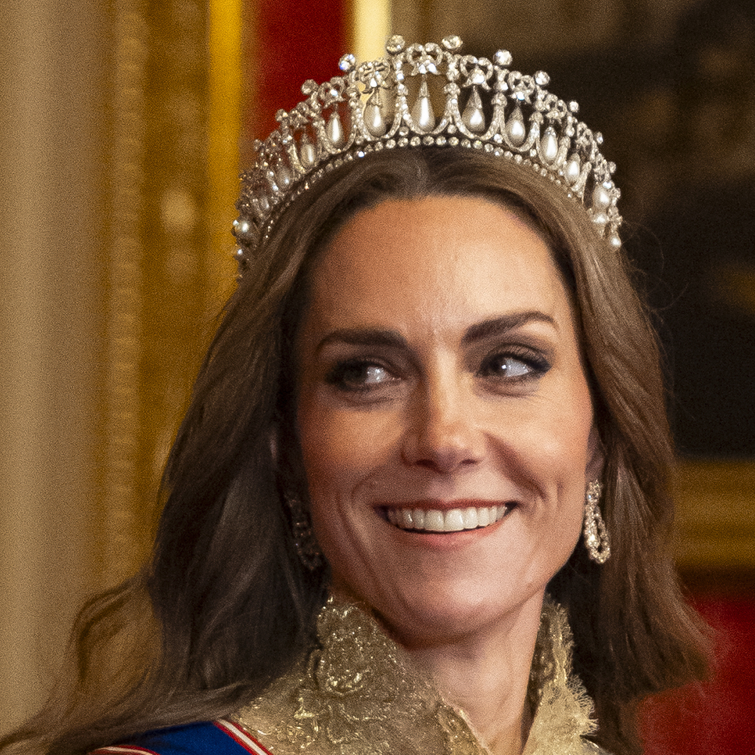 Kate Middleton wearing a tiara and gold gown