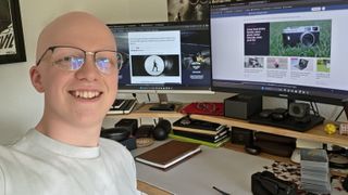 Hamish stood by his Eureka Ergonomic Aero Pro desk