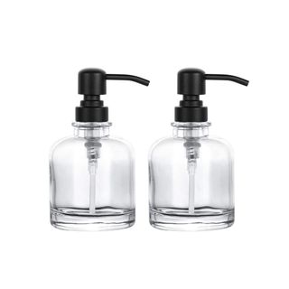 Two glass soap dispensers