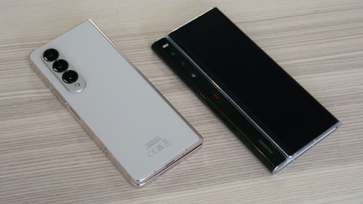 Samsung Galaxy Z Fold 4 and Huawei Mate Xs 2 closed on table angled