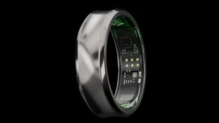 Black titanium VIV Ring with green-lit smart sensors on black background