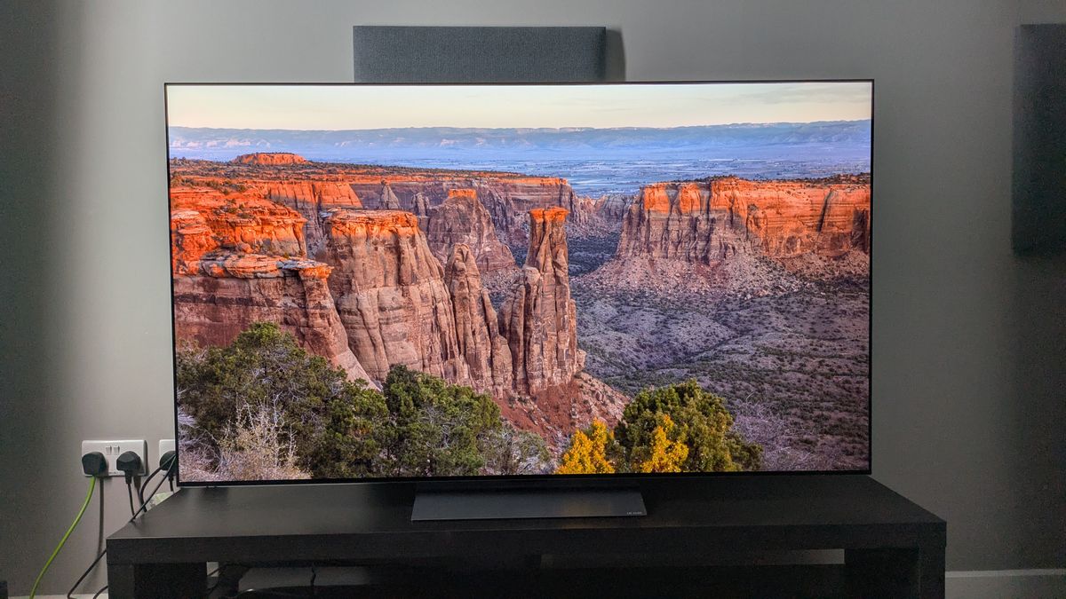 LG C5 with sunrise over canyon on screen