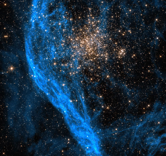 For this image of NGC 1850, two filters were used with Hubble’s camera to gather data, one at visible wavelengths the other at near-infrared wavelengths. Following chromatic order, the shorter wavelength visible light data is blue, while the longer near-infrared data is red. Image credit: NASA / ESA / P. Goudfrooij, Space Telescope Science Institute / Gladys Kober, NASA & Catholic University of America.