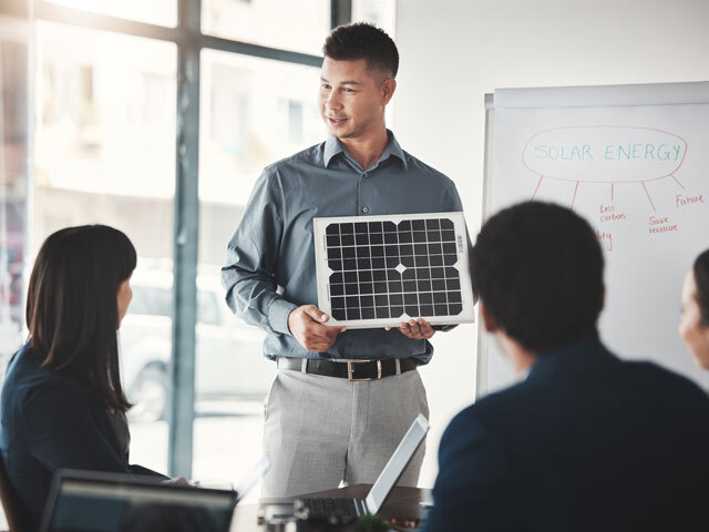 A stock photo of a businessman doing a presentation