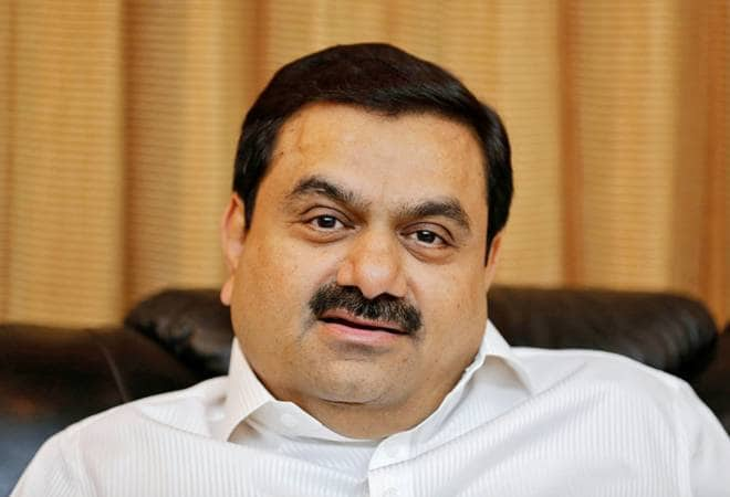 Adani, Total join hands to set up retail network, LNG terminal.