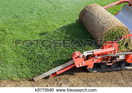 Stock Photography of Grass Baling Machine k9773540.