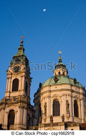 Pictures of Prague baroque church with moon.