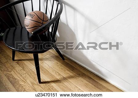 Stock Photography of Basket ball in black captains chair u23470151.