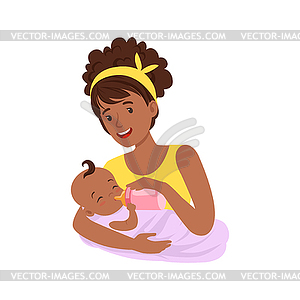 Young black mother breastfeeding her baby with.