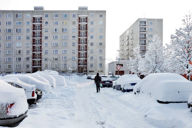 Image Of 39 Panel Building And Snow Covered Car Lot In Town With.