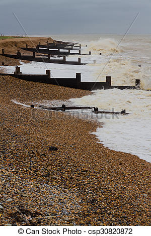 Picture of Stormy English Beach with groynes.