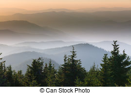 Stock Photography of Distant mountain range and thin layer of.