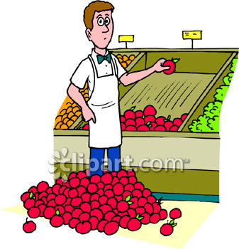 Boy in a Grocery Produce Section with a Pile of Apples at His Feet.