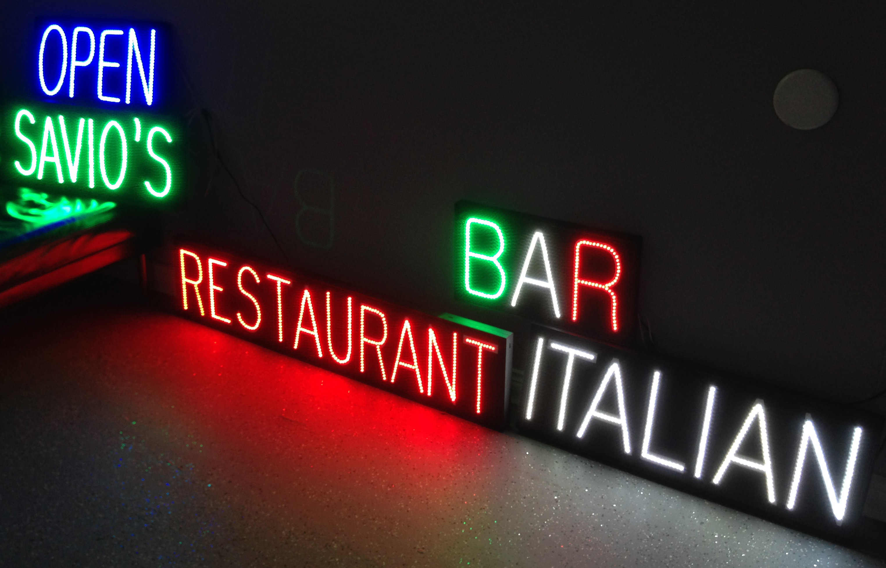 Custom LED signs for restaurant in Italian flag colors.