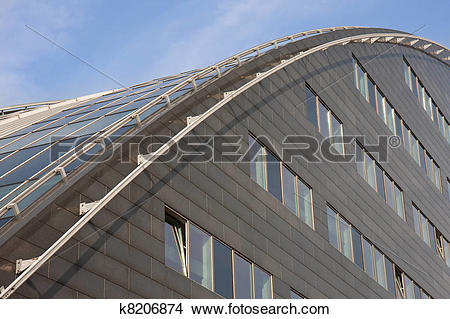 Stock Photo of Modern building with curved roof of glass k8206874.