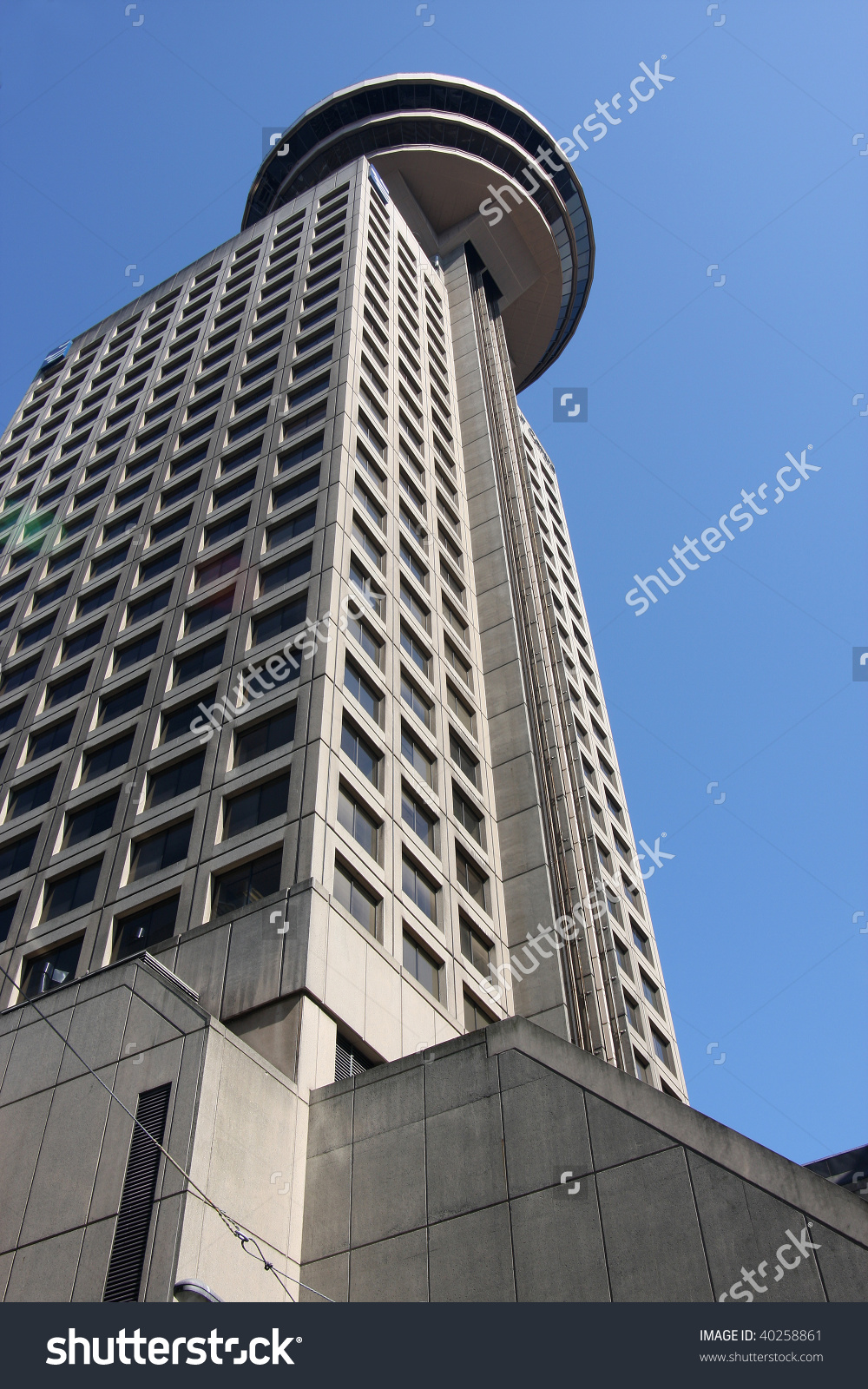 High Rise Building With A Rotating Tower Restaurant. Stock Photo.