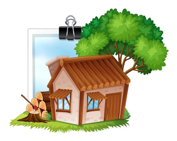 Wooden cottage on photoframe.