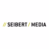 Seibert Media Logo: Zwei Schrägstriche in Gelb und Schwarz, gefolgt von dem Text "SEIBERT / MEDIA" in Schwarz.