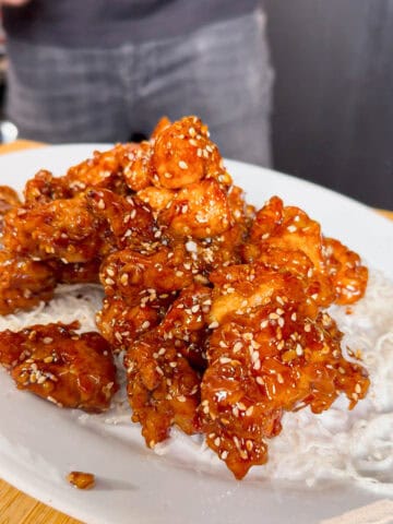 Plated Sesame Chicken with Sesame Seeds and Rice