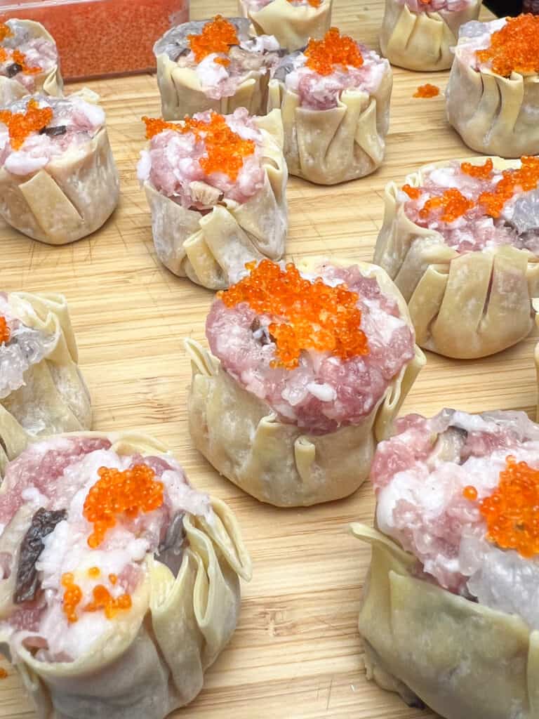 how to make pork and prawn siu mai topped with flying fish roe