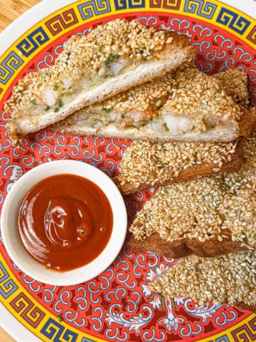 Deep fried Prawn toast topped with sesame seeds