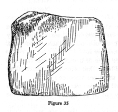 roughly rectangular knife made of bone