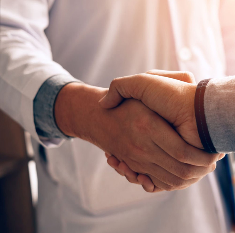 two people shaking hands