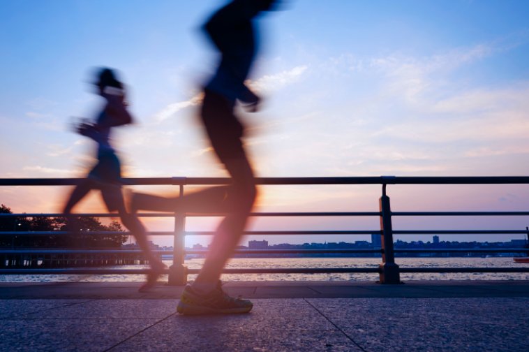 Two People Captured Jogging in Motion