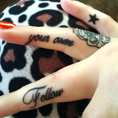 Inner Finger Tattoo