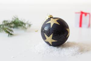 Christmas ball on snow