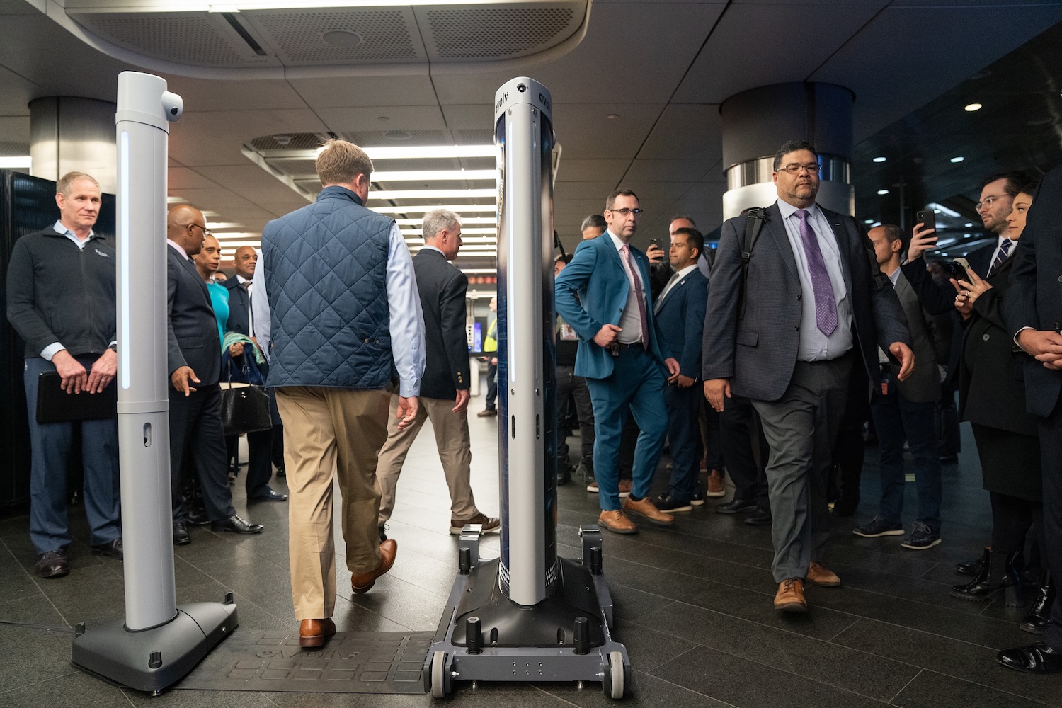 Members of law enforcement demonstrate an Evolv weapons detection during a press conference announcing weapons detectors for the New York City subway system in the Fulton Transit Center March 28, 2024, in Manhattan, New York City.