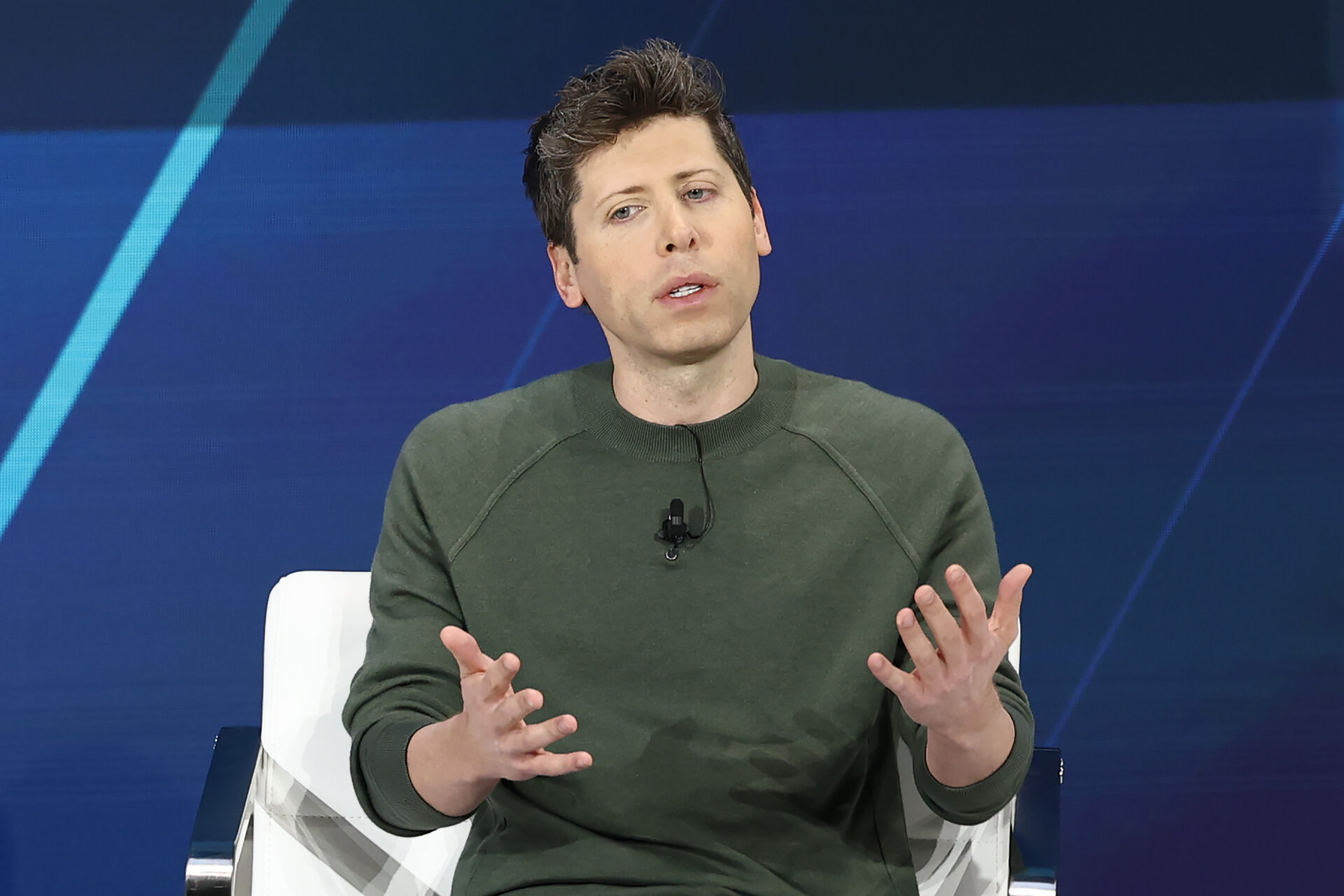 Sam Altman speaks at a conference