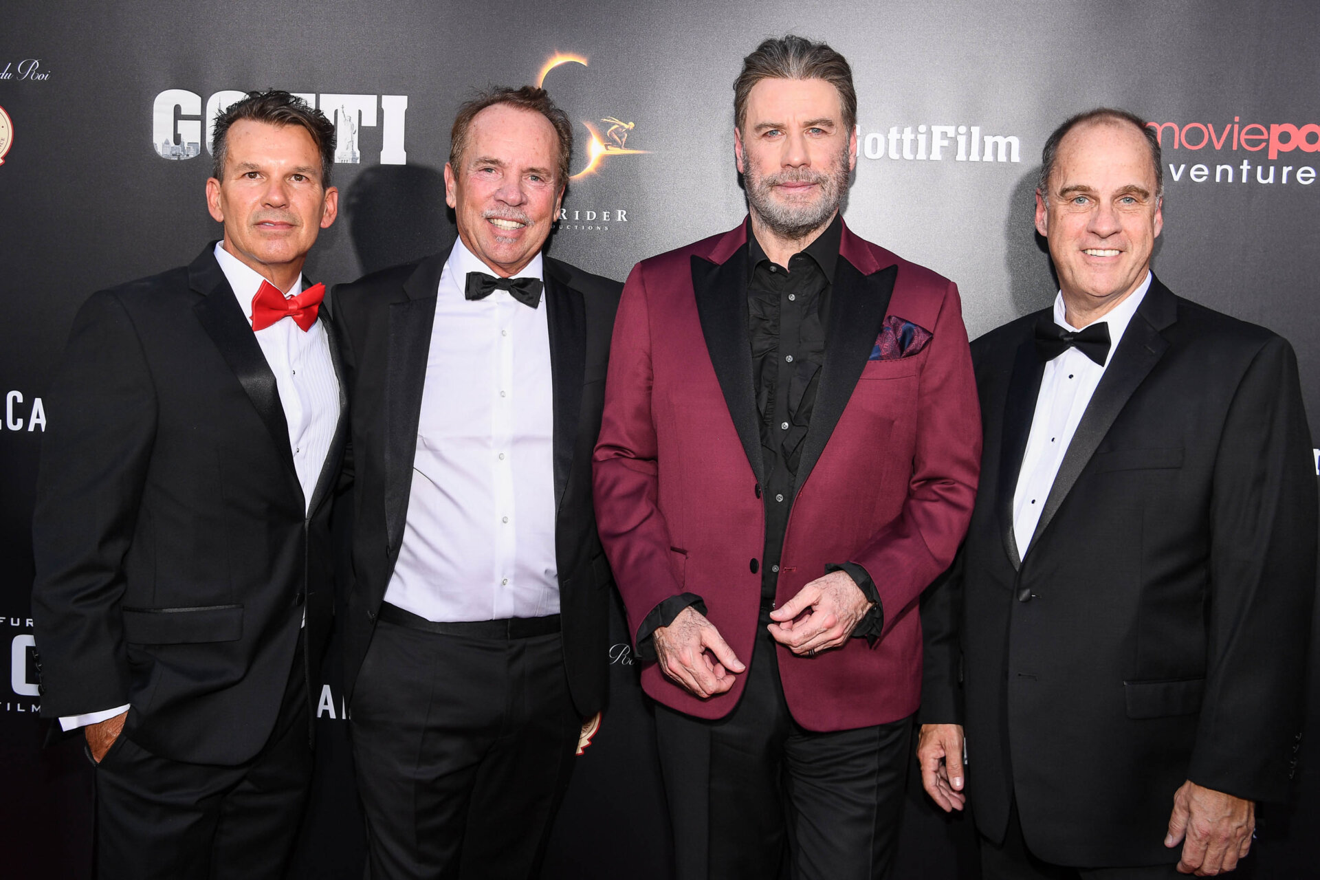 Rod Vanderbilt, Mitch Lowe, John Travolta and Ted Farnsworth attend the New York premiere of Gotti