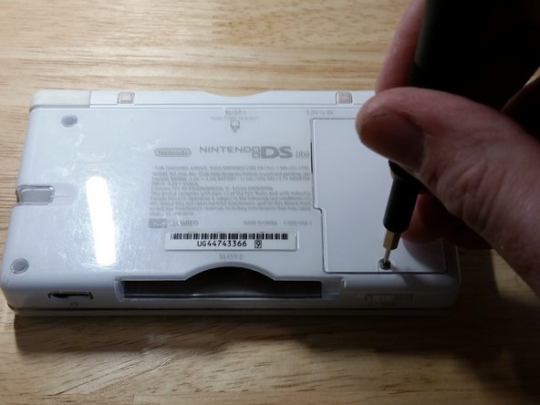 Nintendo DS Lite Disassembly, Remove the battery: step 2, image 1 of 3