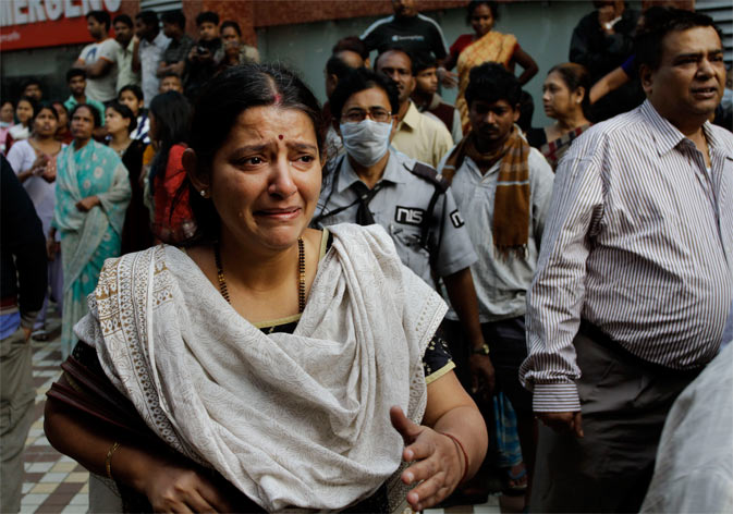 A relative cries after a fire broke out at a nursing home in Kolkata, India, Friday, Dec. 9, 2011. ? AP Photo