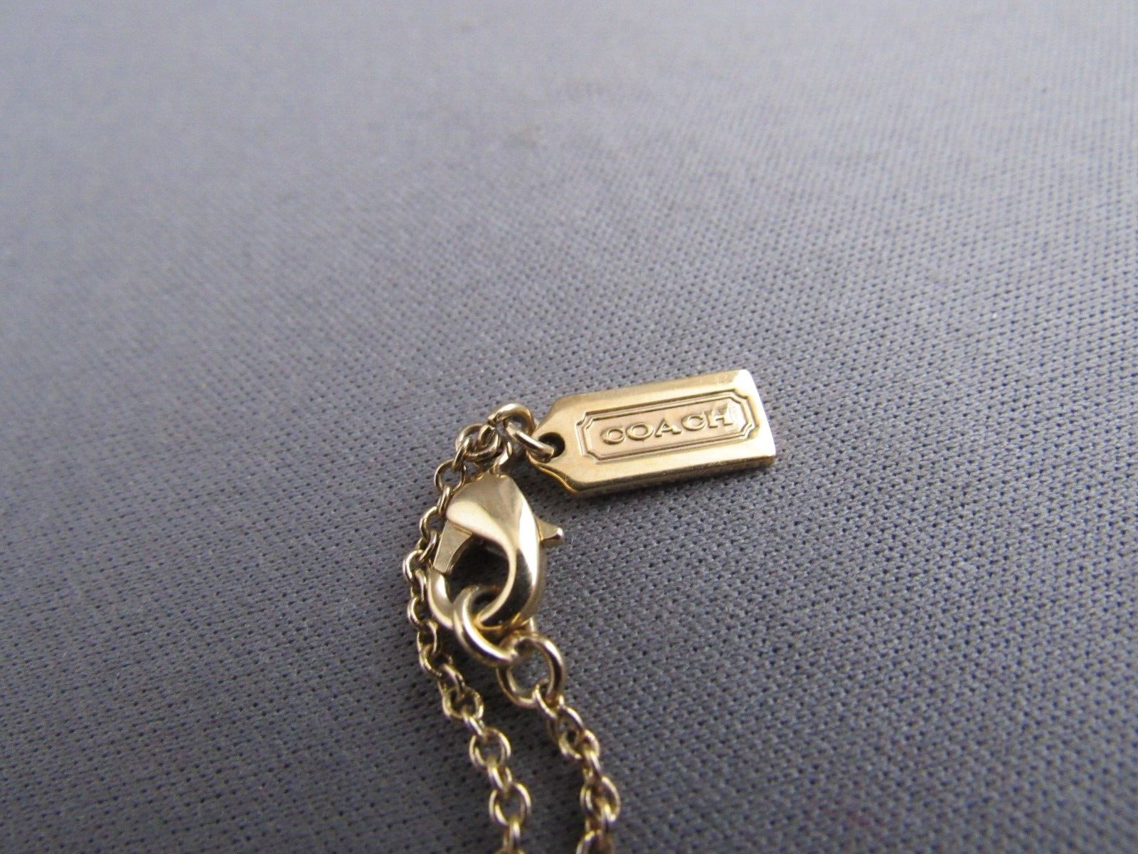 COACH GOLD TONE LOGO RHINESTONE PENDANT CHARM COL… - image 5