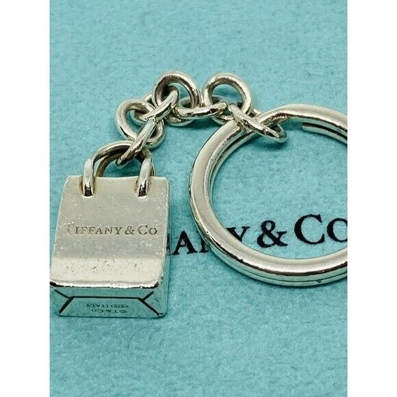 TIFFANY AND CO. STERLING SILVER SHOPPING BAG KEYC… - image 1