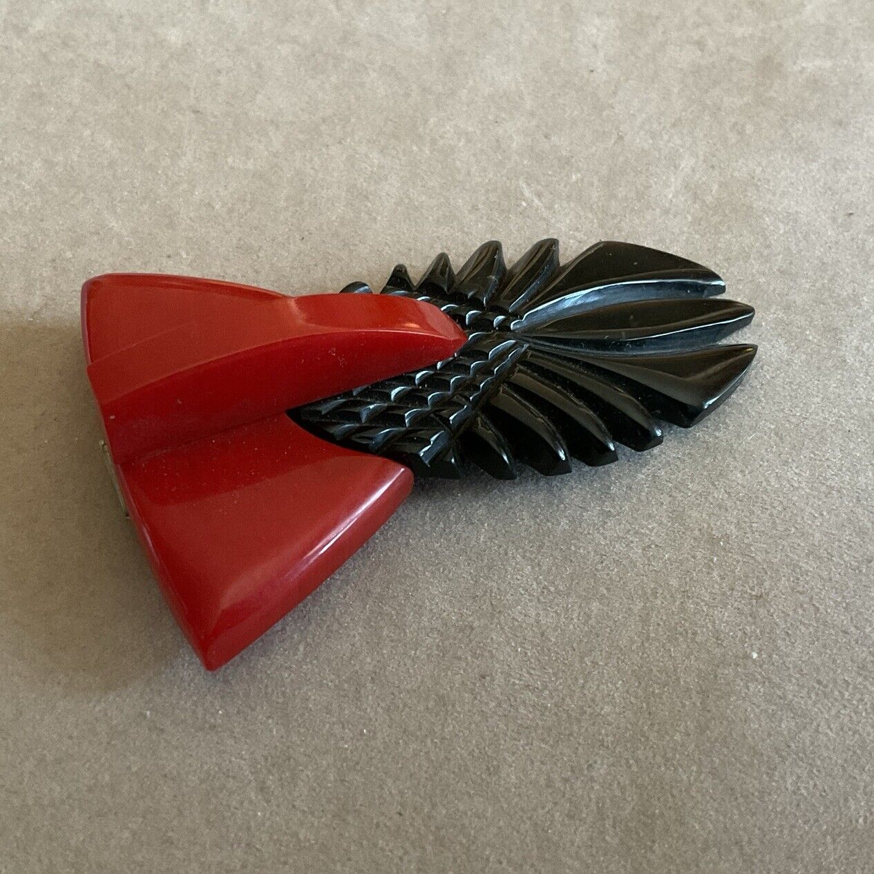 Vintage Red and Black Carved Bakelite Dress Clip - image 1