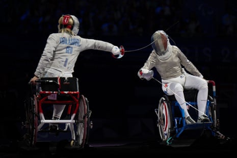 Nino Tibilashvili and Brianna Vidé fence in wheelchairs