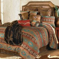 Get a load of this exclusive! A dazzling diamond design is woven in red, coral, turquoise and chocolate cotton chenille on the Southwestern Canyon Shadows Queen Bed Set.This rustic bedding set includes a 88"W x 94"L comforter, 60"W x 80"L x 15"H bedskirt, two 20"W x 27"L standard shams and 9"W x 20"L fringed neckroll. Additional pillows sold separately. Dry clean.