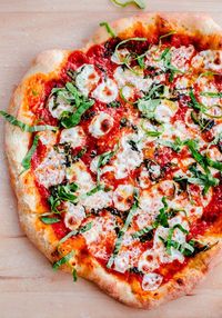 The BEST homemade margherita pizza prepared in a standard oven with everyday ingredients - you'll make this margherita pizza recipe over and over again.