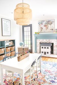 A dated, unorganized playroom gets a bright and whimsical makeover with organizational strategies, ideas for adding function, and DIY-able projects to create the perfect kid's space on a budget. #kidsroom #playroom #kidsdecor #toyorganizing