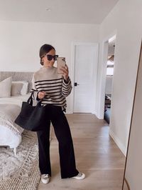 This entire outfit is 25% off right now at Bloomingdale's! These wide legged black jeans pair well with this matching black Onyx Naghedi tote bag (size medium) and striped sweater. You can check out the details on my LTK page! | sale, shop, shopping, looks, outfit, clothes, style, wardrobe, inspiration, fashion