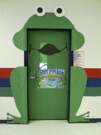 This is my creation of a Frog on my classroom door. As you can see he was fairly simple to make. Most everyone thought it turned out rather cute! In retrospect, I think I could've made his feet bigger and made a few other adjustments. Pleased overall since this was my first frog door. LOL