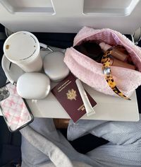 travel airplane picture ideas tray table with passport airmax summer and spring 2024 outfit ideas. new trend forecast. cute fresh new fits. scandinavian style and aesthetic stockholm style minimalist style matcha run or coffee run outfits and aesthetic photo dump ideas