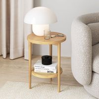 Fall in love with our 2-tier Sonia bohemian round side table. Sonia is the perfect addition to your bohemian style home with its natural brown solid wood legs and beautiful plastic rattan details. This light wood side table features sleek tapered legs and delicate rounded edges for that chic yet classic look. One of our most beautiful boho end tables, Sonia round side table adds both style and function in your living space. Use the round end table top to display photos and other art, and maximize the bottom cane storage for some magazines or board games. Pair it with the Sonia Coffee Table to complete this beautiful set and elevate your living room in no time! Nathan James is the furniture company built for this generation. You don't need to spend a fortune to get quality design-first furn