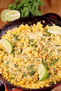 Skillet Mexican Street Corn is a quick and easy side dish to add to just about any dinner. Everything you love about Mexican Street Corn on the Cob but much easier to serve and enjoy! Buttery corn with a creamy sauce, a splash of lime and cotija cheese. 