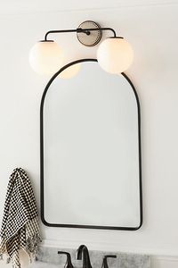 For a contemporary home, this vanity sconce fuses a modern aesthetic with inspiration from lighting seen in traditional Parisian cafes.*This item is UL listed, meaning it has been tested and approved to meet the government-regulated safety standards for the USA. Use with electrical outlets 110-120v or lower, as anything higher can cause fire or injury. If you're purchasing this item for use outside of the United States, employ the adapter and voltage converter suited for your country.*