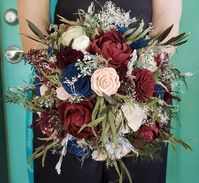 This gorgeous, full bouquet contains an amazing mix of preserved and dried greenery to accent beautiful wooden flowers. Burgundy peonies are the stars of this bouquet - perfect for any bride. Shown in the 10 inch size- message me to see more or to request a custom bouquet. View my