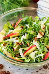 This fennel salad is a blend of arugula, fresh apples, thinly sliced fennel, celery and candied pecans, all tossed together in a homemade dressing. A unique and unexpected salad that always gets rave reviews!